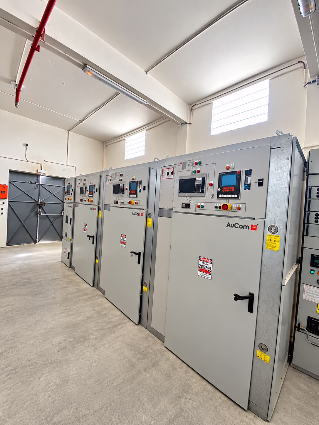 AuCom MVE medium-voltage soft starter cabinets installed in an electrical substation